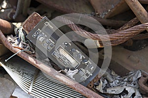 Automotive sound system in junkyard