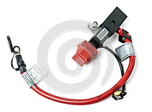 Automotive wiring harness with positive battery terminal and squib for disconnection in case of an accident. Vehicle security
