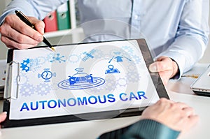 Autonomous car concept on a clipboard