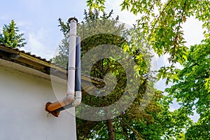 Autonomous heating exhaust pipe. Background with selective focus and copy space