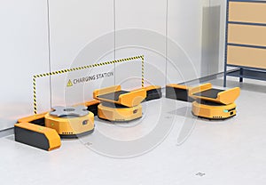 Autonomous Mobile Robots charging in modern warehouse