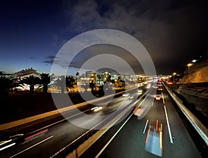 Autopista del Sur highway traffic after the sunset, Costa Adeje, Tenerife, Canary Islands, Spain, March 2023 photo