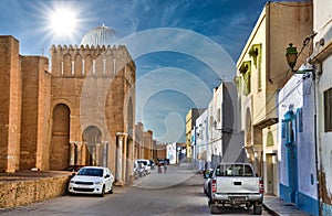 Autos near ancient Great Mosque, Kairouan, Sahara Desert, Tunisia, Africa