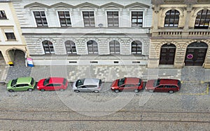 Autos parked on street