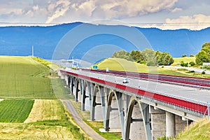 Autostrada highway in Europe. D1 magistal near Spissky hrad, arched bridge. Motorway viaduct bridge, Spis region, Slovakia.