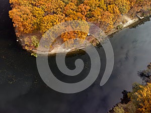 Autumn aerial look down on river in forest