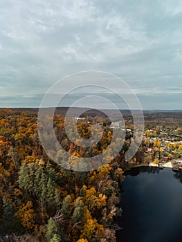 Autumn aerial panorama of colorful river valley