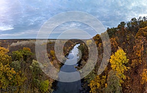 Autumn aerial river scenery with forest riverside