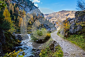 Autumn alpine stream view from mountain hiking path to Tappenkarsee, Kleinarl, Land Salzburg, Austria