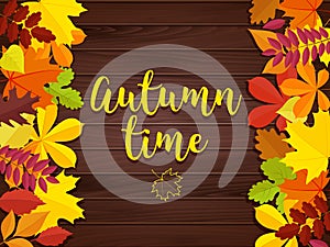 Autumn background. Frame for text decorated with autumn leaves. Wooden backgroun with autumn leaves and lettering