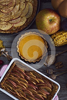 Autumn background. Homemade Pumpkin, apple Pies for Thanksgiving