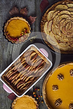 Autumn background. Homemade Pumpkin, apple Pies for Thanksgiving