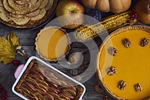 Autumn background. Homemade Pumpkin, apple Pies for Thanksgiving