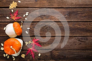 Autumn background with leaves and pumpkins, thanksgiving and halloween card