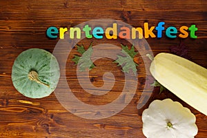 Autumn background with pumpkins and autumn leaves, Thanksgiving erntedankfest. Wooden background, top view