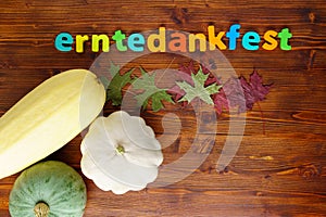 Autumn background with pumpkins and autumn leaves, Thanksgiving erntedankfest. Wooden background, top view