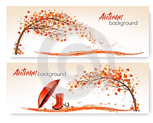 Autumn banners with trees and umbrella and rain boots.