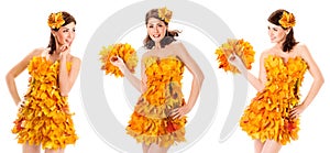 Autumn Beauty Model in Yellow Maple Leaf Dress over Isolated White. Happy smiling Young Woman with Maple Leaves Bouquet. Fall