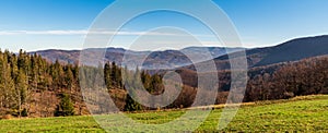 Autumn Beskid Slaski mountains from meadow bellow Mala Czantoria hill summit in Poland