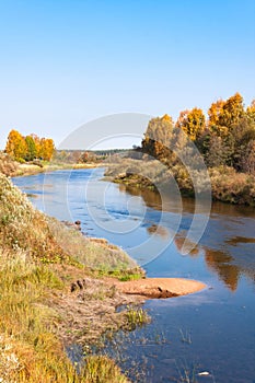 Autumn blue sky bend in the river with sandy bank in Vologodskaya oblast, Russia