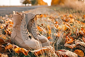 Autumn boots in the forest, style and fashion concept