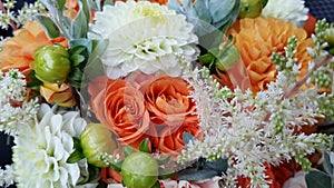 Autumn bouquet of white and orange asters. Beautiful large flowers. Teacher`s Day Gift