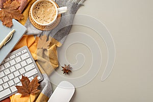 Autumn business concept. Top view photo of keyboard computer mouse notebook pen cup of cocoa on rattan serving mat anise yellow