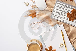 Autumn business concept. Top view photo of keyboard computer mouse planners pen binder clips cup of coffee on rattan serving mat