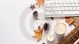 Autumn business concept. Top view photo of keyboard notepad pencil candles on rattan serving mat map fallenle leaves pine cones