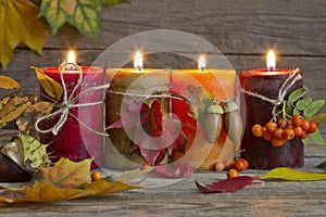 Autumn candles with leaves vintage abstract still life