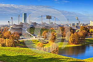 Autumn cityscape - view of the Olympiapark or Olympic Park and Olympic Lake in Munich