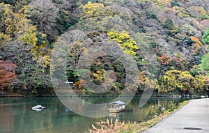 Autumn color of Asashiyama mountain and Oigawa river in Kyoto, J