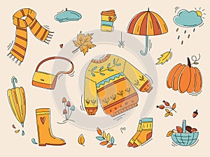 Autumn color doodles. Hand drawn color vector set of sketches: jumper, umbrella, boots, cloud, leaves, pumpkins. Autumn walking,