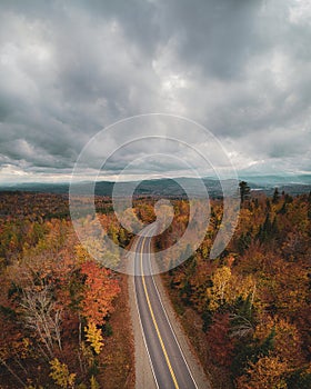 Autumn color and road near Abbot, Maine