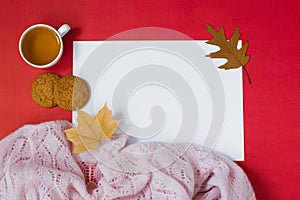 Autumn composition Fly lady with a cup of tea and yellow autumn leaves. The concept of tea break time. A hot drink and a clean