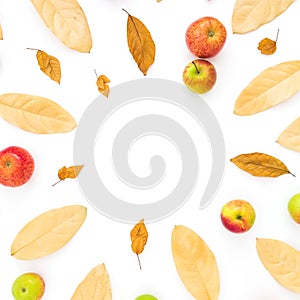 Autumn composition. Frame made of autumn dried leaves and apple fruits on white background. Flat lay, top view, copy space