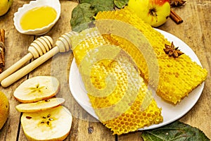 Autumn composition with fresh apples, pears, honeycombs and fragrant spices