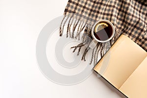 Autumn, cozy composition. Cup of tea, warm scarf, book, isolated on white background