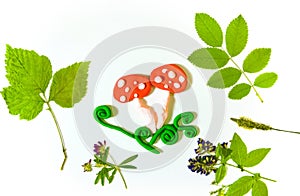 Autumn crafts with natural dry flowers, grass, leaves. Creating mushrooms from plasticine