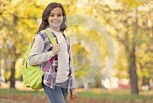 this autumn day. child walk in autumn forest. fall leaves in park. seasonal weather. childhood happiness. beauty and