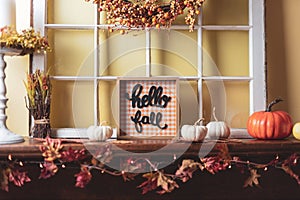 Fall decorations on the fireplace mantel photo