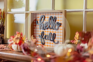 Hello fall sign on the mantel photo