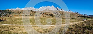 Autumn Dolomites mountain tops panoramic view, Trentino, Italy photo