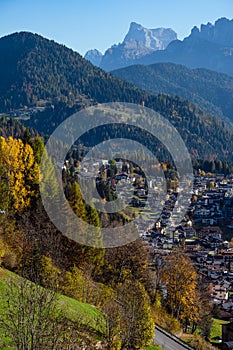 Autumn Dolomites village Falcade, Italy photo