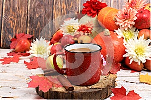 Autumn drink, seasonal composition, hot coffee with cinnamon in iron mugs on wooden background, copy space, Happy Thanksgiving