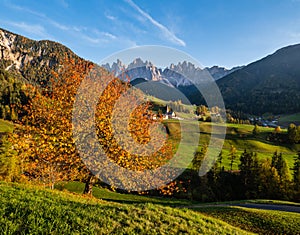 Autumn evening Santa Magdalena famous Italy Dolomites village view in front of the Geisler or Odle Dolomites mountain rocks.