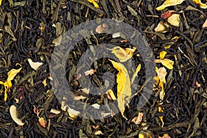 Autumn extravaganza tea. Mix of Ceylon black tea, Sencha, sunflower, rose, almond flakes.