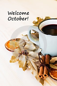 Autumn, fall leaves, hot steaming cup of glint wine