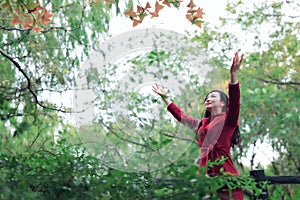 Autumn / fall woman happy in free freedom pose