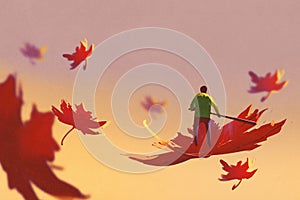 Autumn falling,small man rowing maple leaf floating in the sky